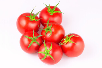 Delicious red tomatoes, isolated on white background