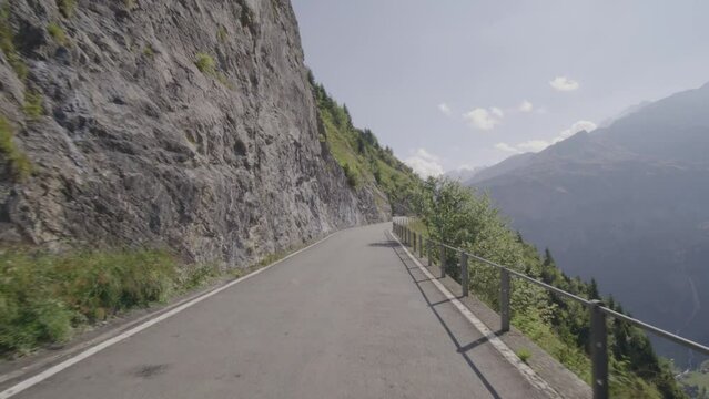 Driving video of the Sustenpass in Switzerland. The Susten pass is a famous alp road and has a scenic mountain panorama. View from the car. Experience calming nature and exciting pass roads.