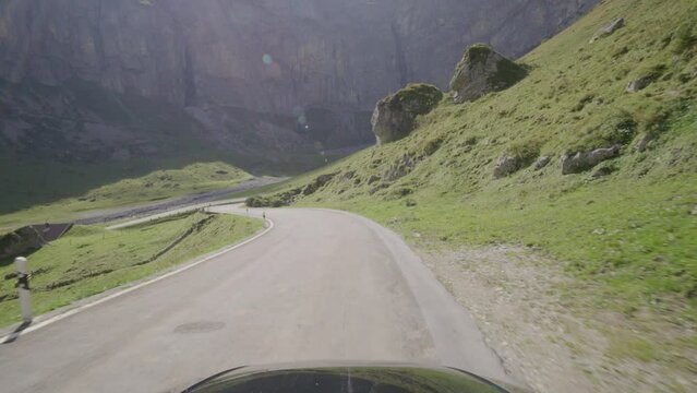 Driving video of the Sustenpass in Switzerland. The Susten pass is a famous alp road and has a scenic mountain panorama. View from the car. Experience calming nature and exciting pass roads.