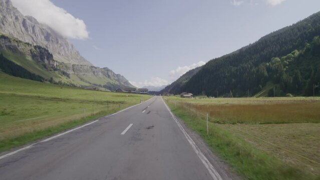Driving video of the Sustenpass in Switzerland. The Susten pass is a famous alp road and has a scenic mountain panorama. View from the car. Experience calming nature and exciting pass roads.