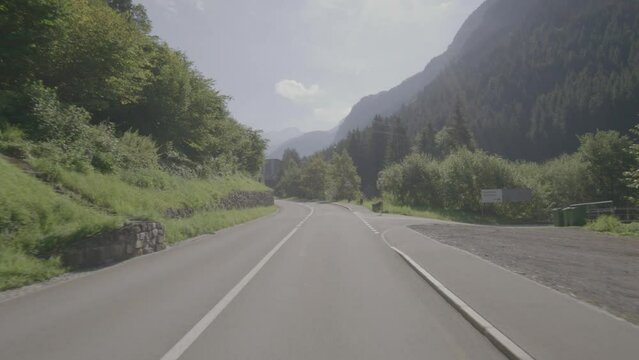 Driving video of the Sustenpass in Switzerland. The Susten pass is a famous alp road and has a scenic mountain panorama. View from the car. Experience calming nature and exciting pass roads.