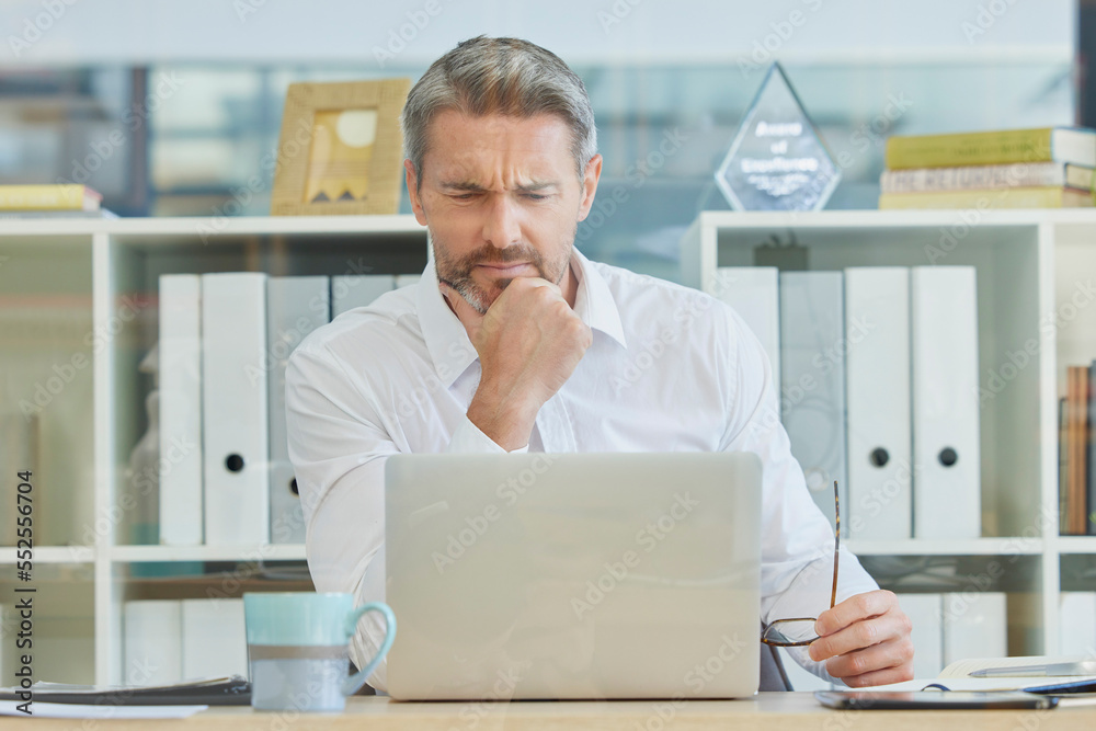 Poster businessman, laptop and thinking and confused in office for 404 error, internet glitch or financial 