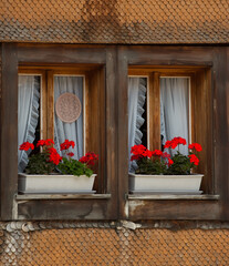 Fototapeta na wymiar finestre di Andermatt (Svizzera)