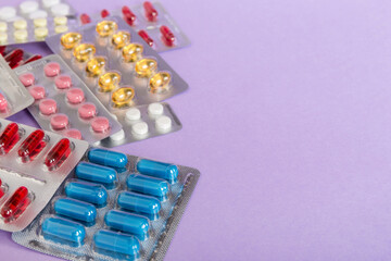 too many different pill of various blisters with different pills Medicines storage at home concept Medication storing. A pile of medicine in blister packs. Pharmaceutical blister packs