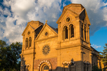 Fototapeta premium Dramatic sky over the Cathedral Basilica in Santa Fe, New Mexico