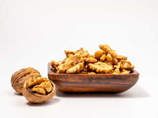 Walnut on a white background. Raw walnut.