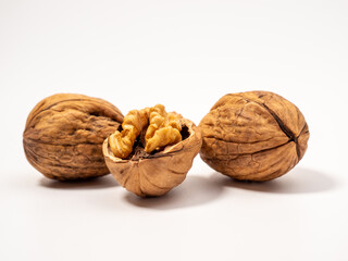 Walnut on a white background. Raw walnut.