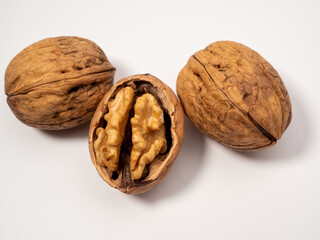 Walnut on a white background. Raw walnut.
