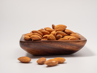 Almond on a white background. Raw almond.