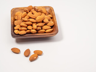 Almond on a white background. Raw almond.