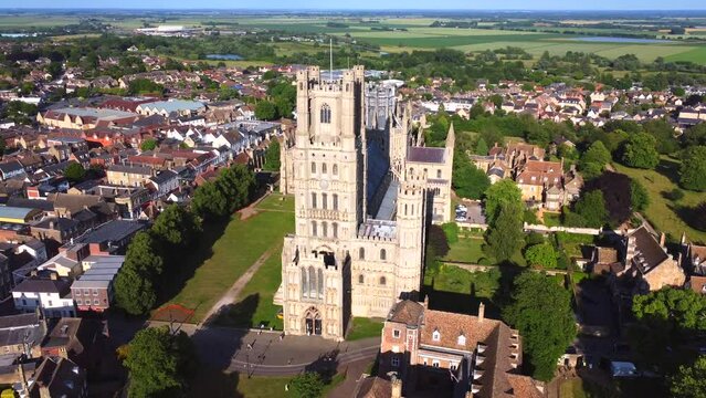 Wide aerial view of Ely Cathedral and surrounding city and countryside. Ely, Cambridgeshire, UK.