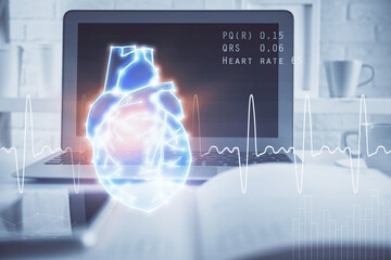 Desktop computer background and heart drawing. Double exposure. Medical study and healthcare concept.