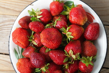 berries of ripe red juicy fresh strawberries