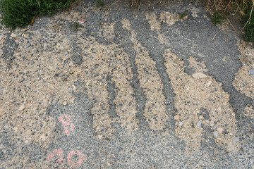 Damaged asphalt texture for background, wallpaper