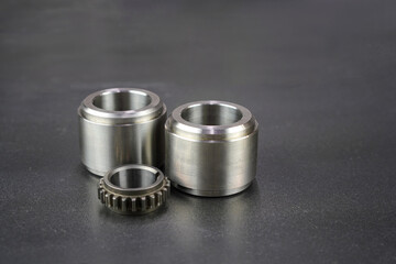 Metal parts in production. Turning bushes, bar, sleeve, gear
