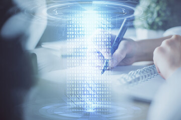 Double exposure of hands making notes background with technology and digital coding huds. Data learning concept.