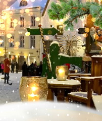 Winter Tallinn, Christmas city decoration on evening street lantern light and  gold confetti,guirland and blurred light in Tallinn old town
