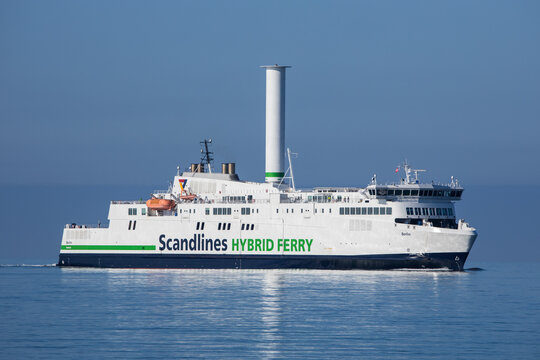 The Scandlines hybrid ferry with its iconic Flettner rotor sail arriving Gedser port in Denmark