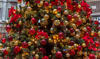 Christmas decorations and toys on the Christmas tree. New Year's atmosphere.