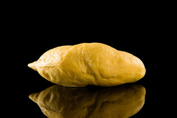 Durian peel fruit isolated on black background