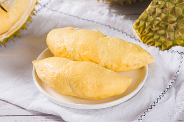 Durian riped and fresh ,durian peel on wooden table.