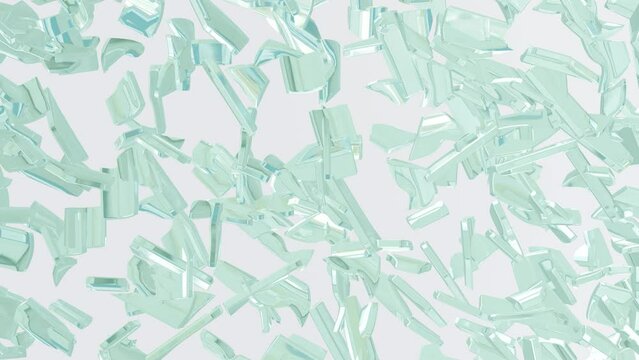 Shards of glass falling on a white surface. Photorealistic glass fragments with reflections.
