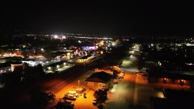 Aerial nighttime view of Tehachapi City, California - aerial flyover