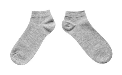 Pair of grey socks on white background, top view