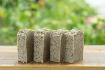 Green handmade scrub soap with wormwood and thyme.