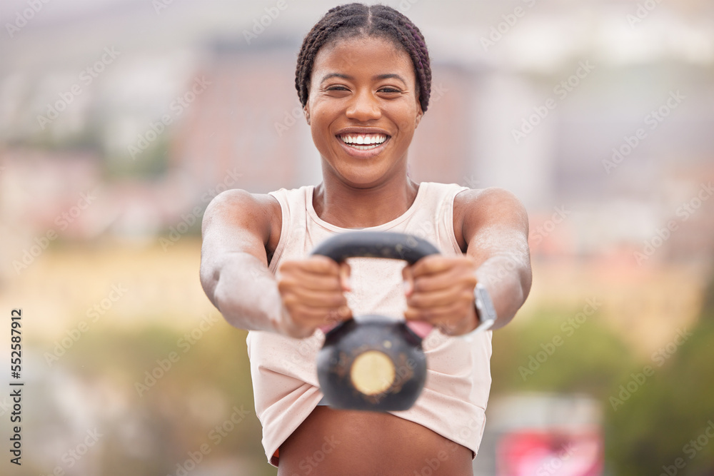 Wall mural Fitness, kettlebell and portrait of woman in city doing a weight training exercise for strength. Sports, African lady and happy athlete doing muscle workout with motivation, health and focus in town.