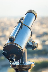 Obraz premium Telescope of the second floor of the Eiffel Tower in Paris, France