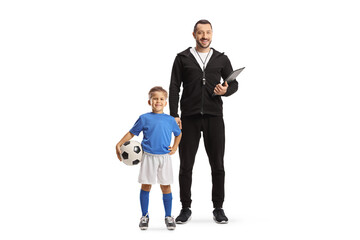 Football coach with a whistle holding a clipboard and a boy standing next to him