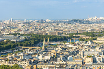 Naklejka premium Pont Alexandre III bridge, Grand Palais and rooftops seen from the second floor of the Eiffel Tower in Paris, France