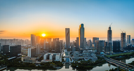 Fototapeta na wymiar Aerial view of city skyline and modern buildings at sunrise in Ningbo, Zhejiang Province, China. East new town of Ningbo, It is the economic, cultural and commercial center of Ningbo City.