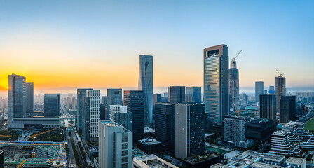 Aerial view of city skyline and modern buildings at sunrise in Ningbo, Zhejiang Province, China. East new town of Ningbo, It is the economic, cultural and commercial center of Ningbo City.
