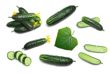 Fresh, whole and halved, chopped cucumbers and gherkins, leaves top view isolated png