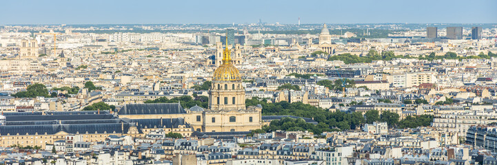 Fototapeta na wymiar Golden dome of the Hotel des Invalides and rooftops of Paris, France