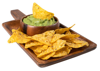 A wooden board with guacamole sauce and nachos