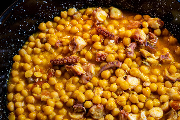 Spanish casserole pot of cheackpeas with octopus Caldero de garbanzos con pulpo