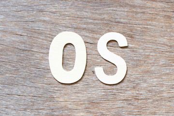 Alphabet letter in word OS (Abbreviation of Operating system) on wood background