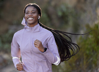 Running, happy and black woman with music in nature, cardio fitness and sports health in mountains...