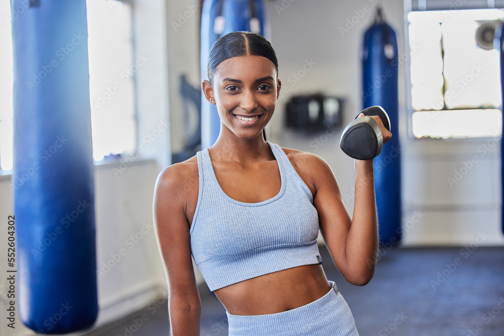 Poster Happy woman, fitness and dumbbell exercise in gym for strong body, wellness and healthy lifestyle goals. Portrait of indian female, sports and happiness with weights for workout, training and power