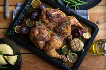 Roasted flat chicken with green beans and polenta 