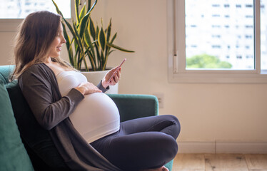 pregnant woman using a smartphone