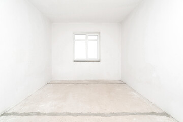 Empty white room without renovation with one window.