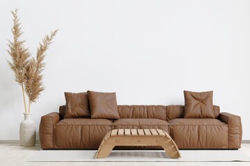 big white living room.interior design,brown leather sofa,wooden table,carpet wall for mock up and copy space.