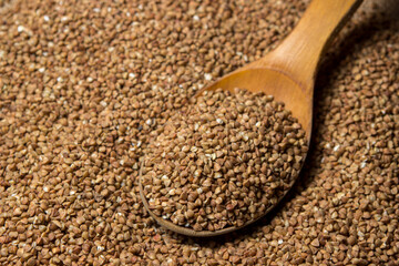 Buckwheat on a background of burlap. Tasty and healthy food