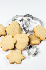 Shortbread cookies with steel molds on a white background. homemade baking