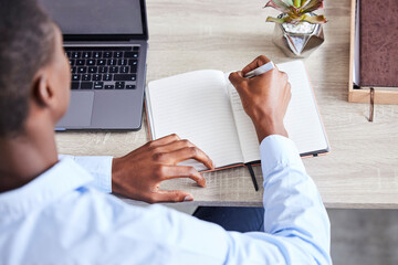 Businessman, writing in notebook and planning corporate schedule, calendar and brainstorming idea for lead generation. Black man, write contact list in book and working on advertising strategy goal - obrazy, fototapety, plakaty