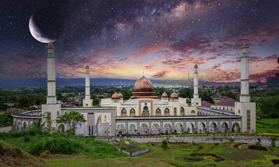 Fototapeta na wymiar Mosque in beautiful sunset sky